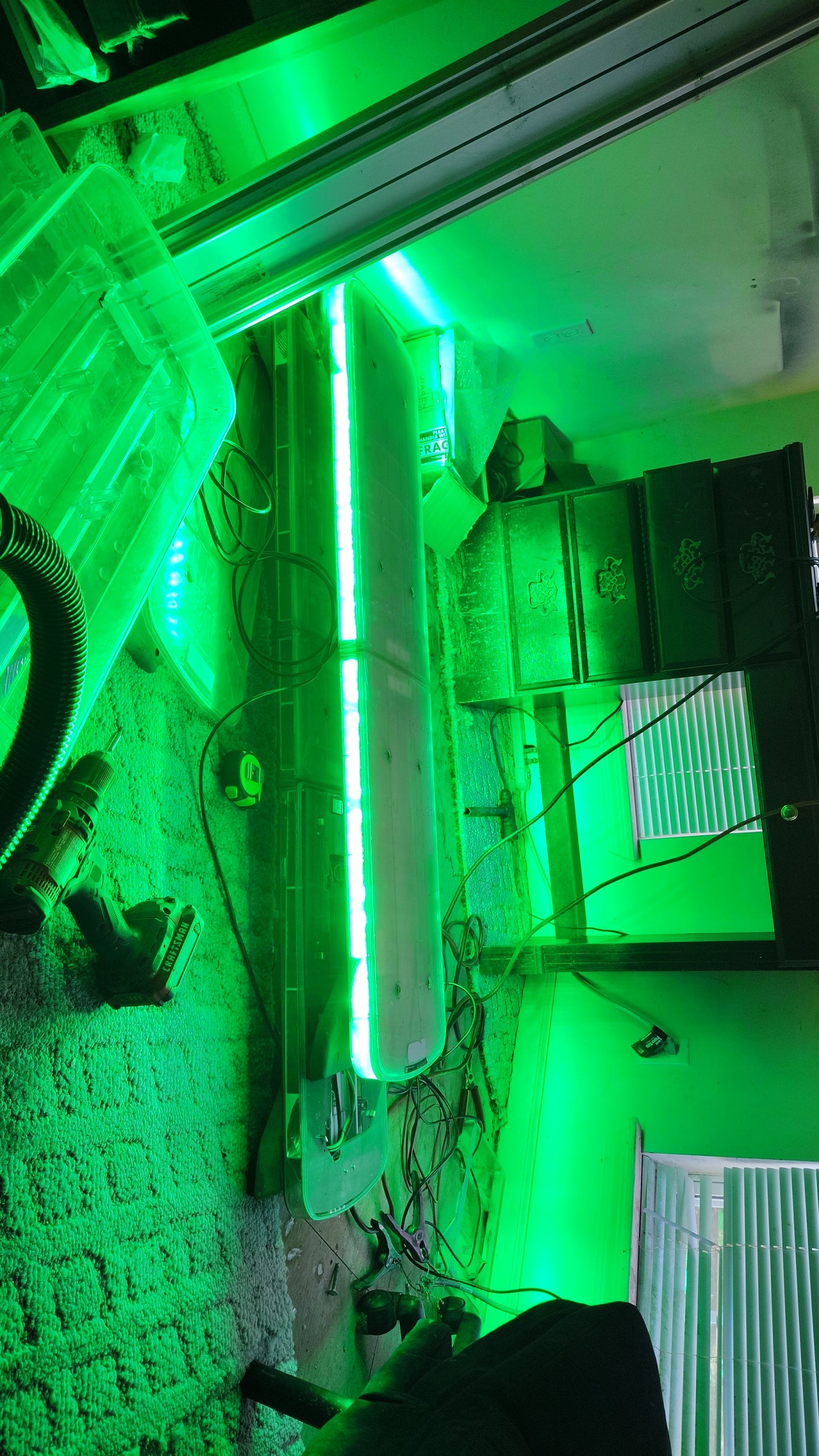 A federal signal allegiant 53 inch green/white duo front rear is all green